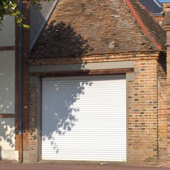 Porte de garage traditionnelle Ultra Compact